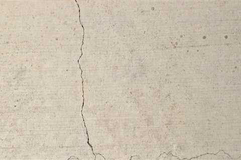 What is considered a hairline crack in concrete?