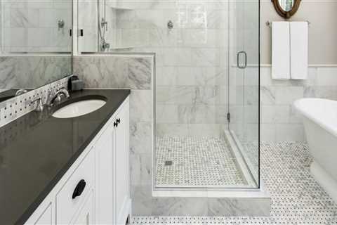 Do you tile a bathroom floor before installing a bath?