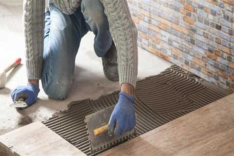 Who installs tile flooring?