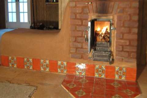 Why are wood-burning stoves more efficient than open fireplaces?