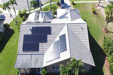 How do solar panels affect roof shingles?