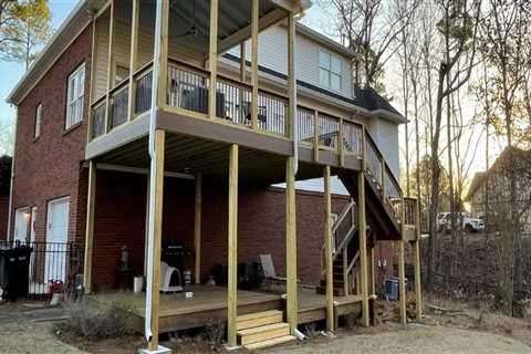 Replacing Damaged Boards: Improve Your Outdoor Living Space with Deck and Roof Renovations