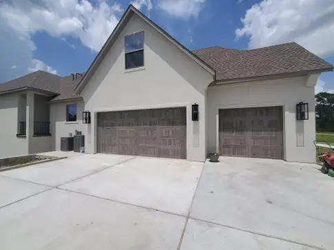 How Can a Garage Door Replacement Enhance Your Home’s Curb Appeal and Energy Efficiency? - Honest..