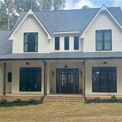 Elevating Your Business Property: Roofing Solutions That Match Natural Stone Building Materials In..