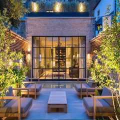 Illuminating Elegance: Outdoor Lighting Designs That Highlight Natural Stone Building Materials In..