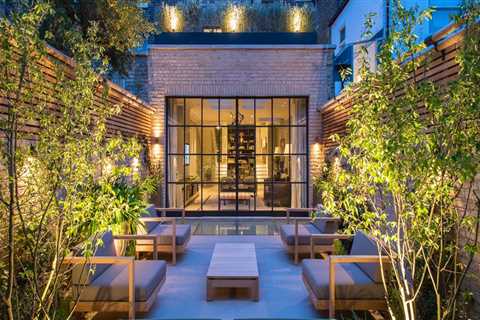 Illuminating Elegance: Outdoor Lighting Designs That Highlight Natural Stone Building Materials In..